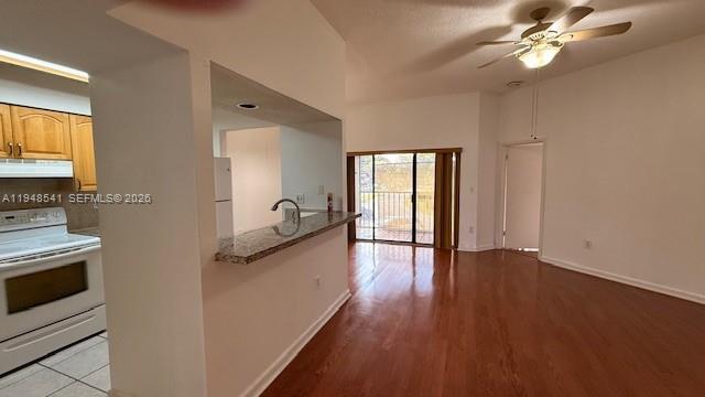 9691 Southwest 138th Avenue, Unit QC2L Miami, FL 33186 - Photo 29 of 48 a view of a kitchen with a sink dishwasher and a microwave