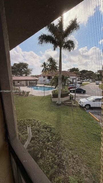 9691 Southwest 138th Avenue, Unit QC2L Miami, FL 33186 - Photo 37 of 48 a view of lake from a balcony