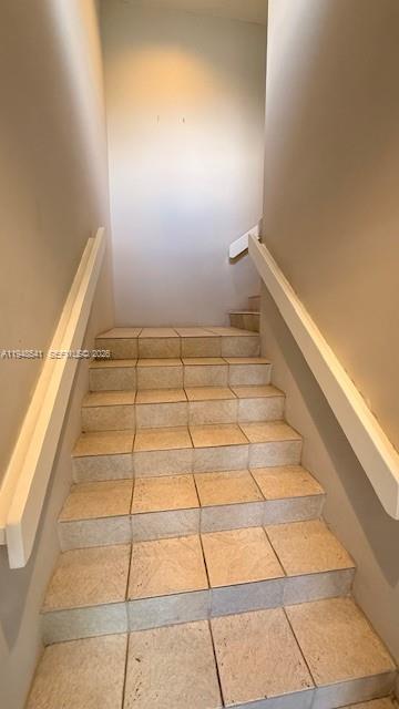 9691 Southwest 138th Avenue, Unit QC2L Miami, FL 33186 - Photo 46 of 48 a bathroom with a shower