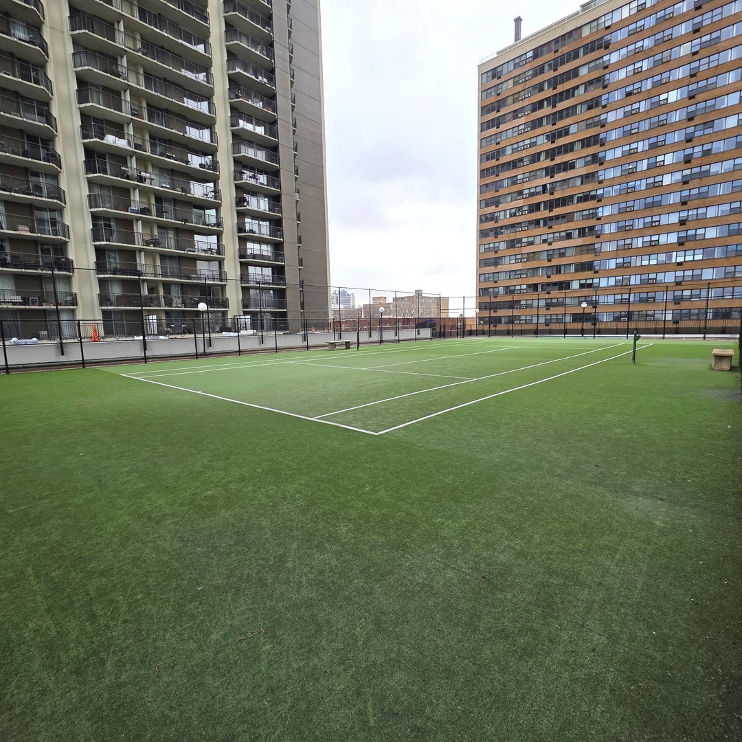 6033 North Sheridan Road, Unit 35F Chicago, IL 60660 - Photo 21 of 26 a view of a city with tall buildings