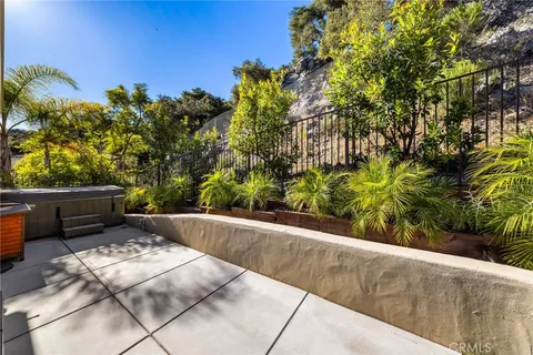 a view of a yard with an outdoor seating