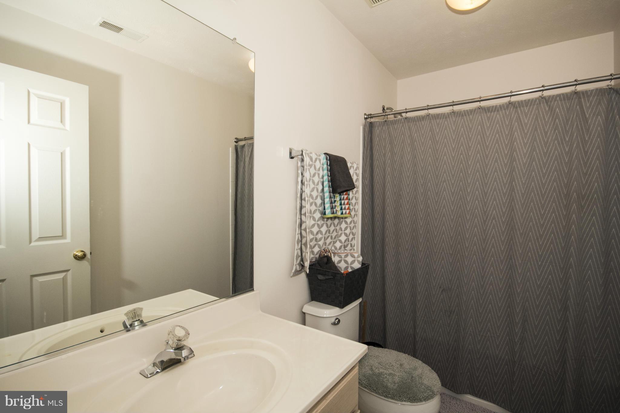 4612 Runnymeade Road Owings Mills, MD 21117 - Photo 19 of 30 Upper Level Hall Bathroom