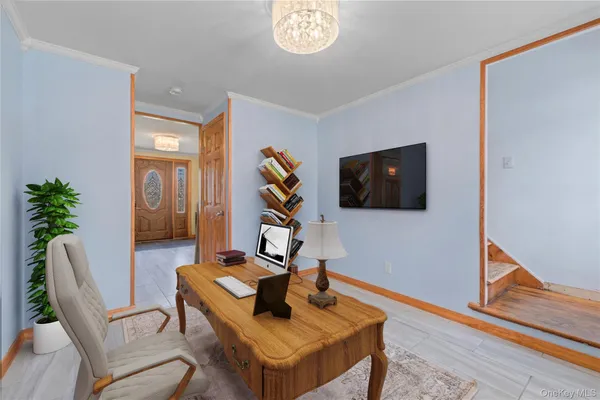 a dining room with furniture and window