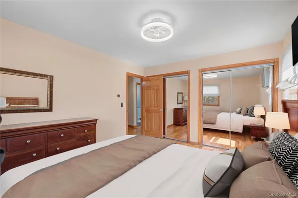 a bedroom with a bed and furniture
