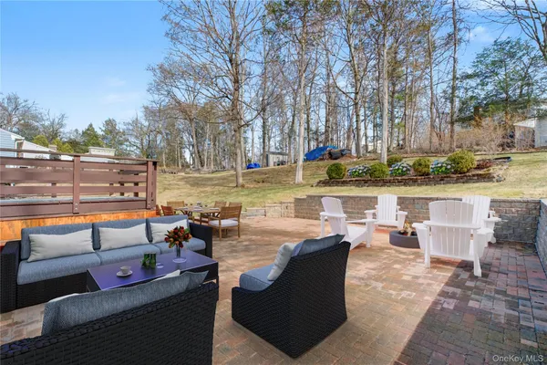 a outdoor space with lots of tables a chairs and a stove