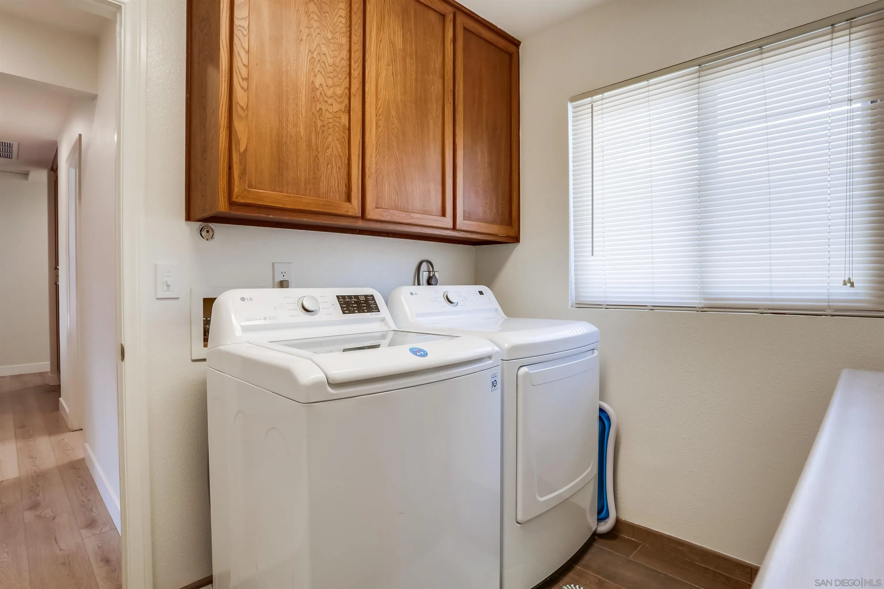 23409 Everett Place Ramona, CA 92065 - Photo 19 of 29 a utility room with dryer and washer