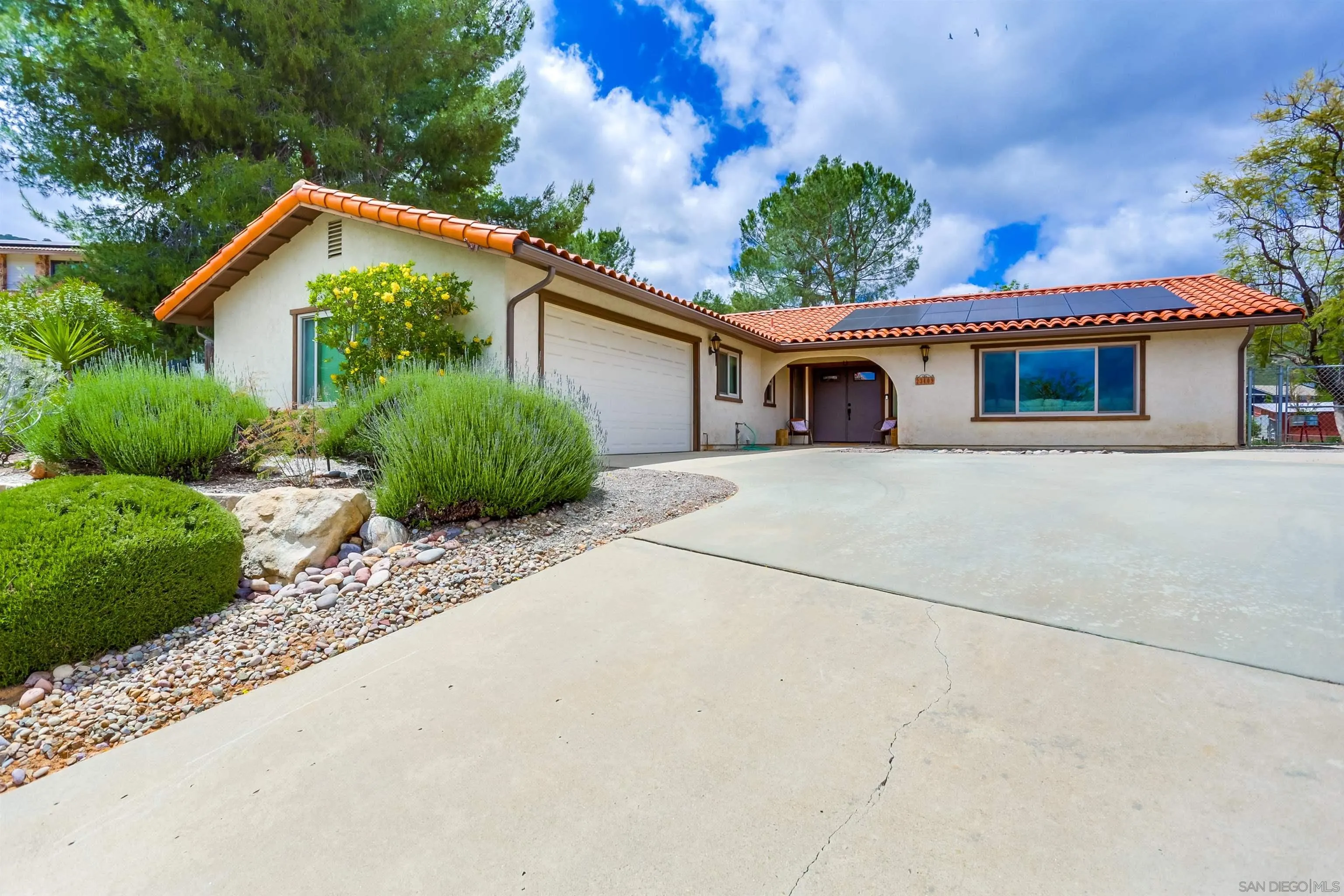 23409 Everett Place Ramona, CA 92065 - Photo 28 of 29 a front view of a house with garden