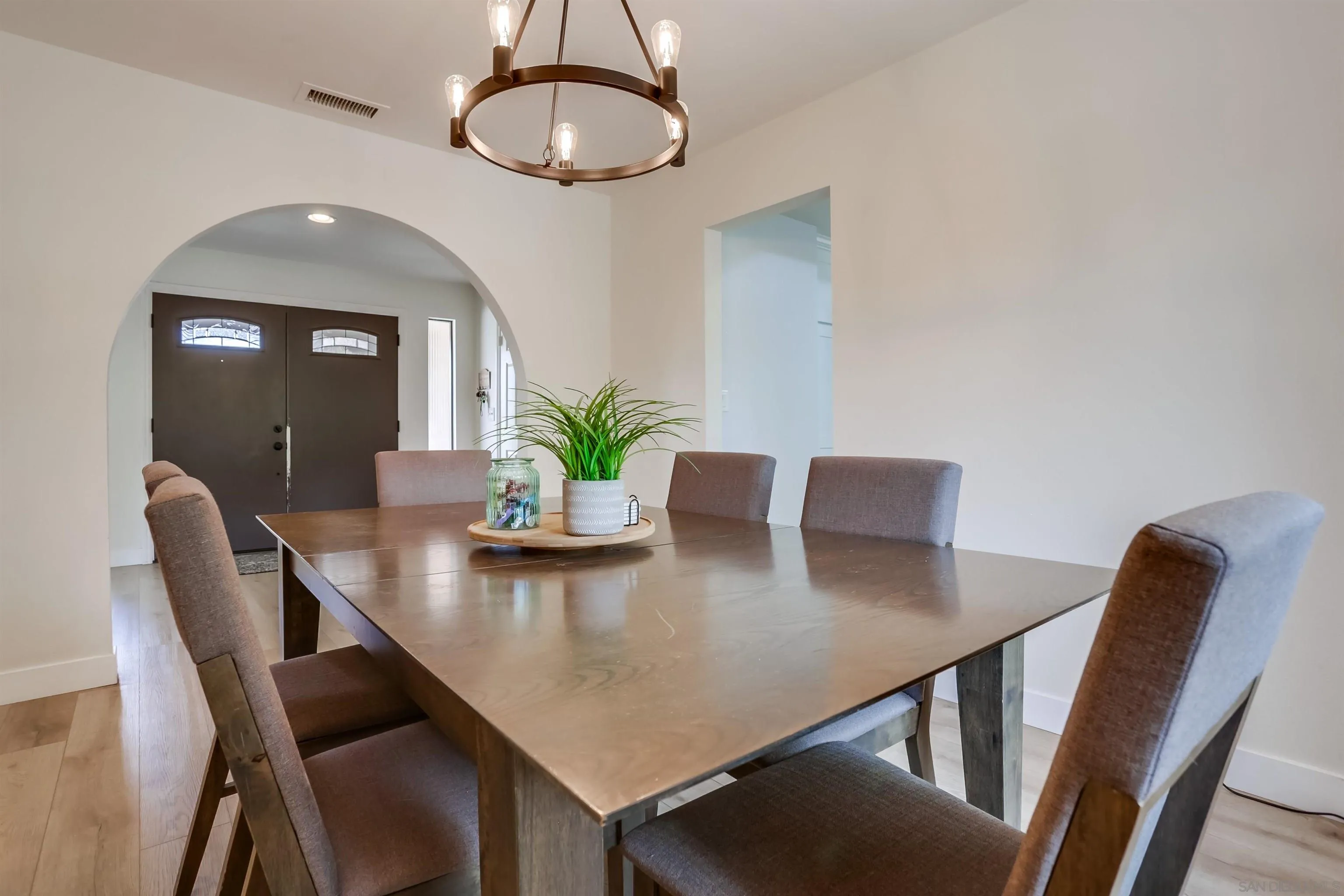 23409 Everett Place Ramona, CA 92065 - Photo 5 of 29 a view of a dining room with furniture and wooden floor