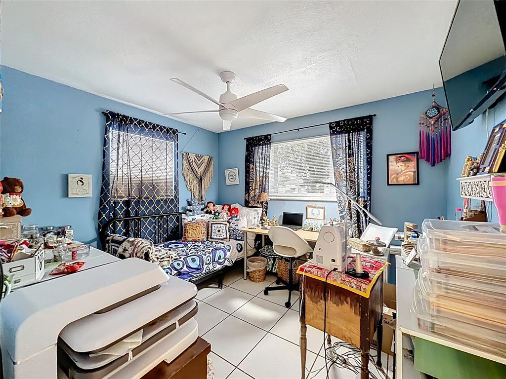 7141 Custer Street Hollywood, FL 33024 - Photo 46 of 84 a living room with furniture and a large window
