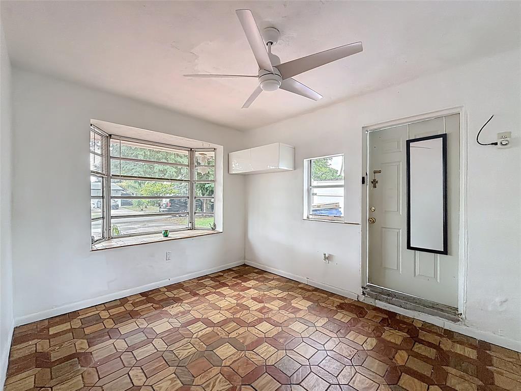7141 Custer Street Hollywood, FL 33024 - Photo 54 of 84 a view of an empty room and window