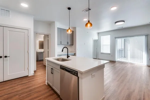 a kitchen with a stove and a microwave