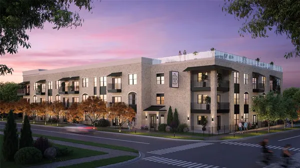 a front view of a building with street view