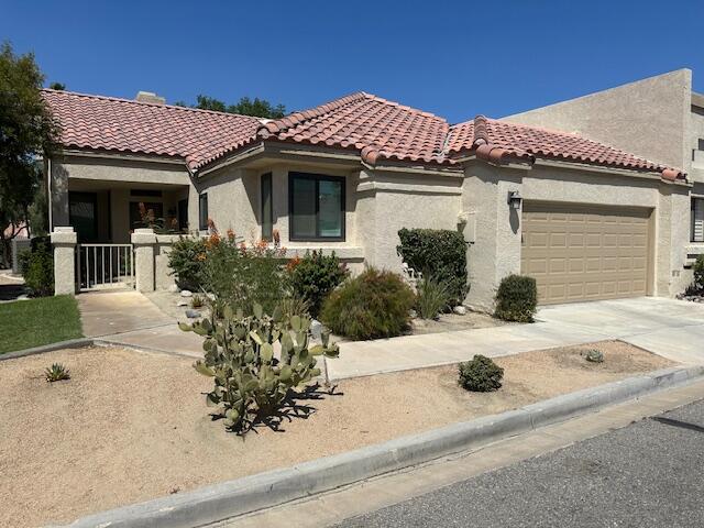 41694 Preston Trail Palm Desert, CA 92211 - Photo 1 of 20 front view of a house