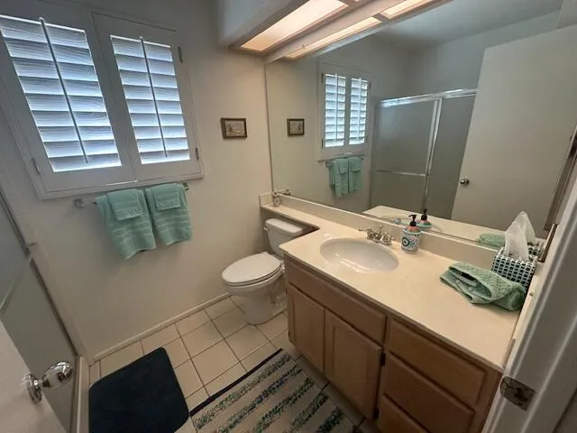 a view of a storage and utility room with washer and dryer
