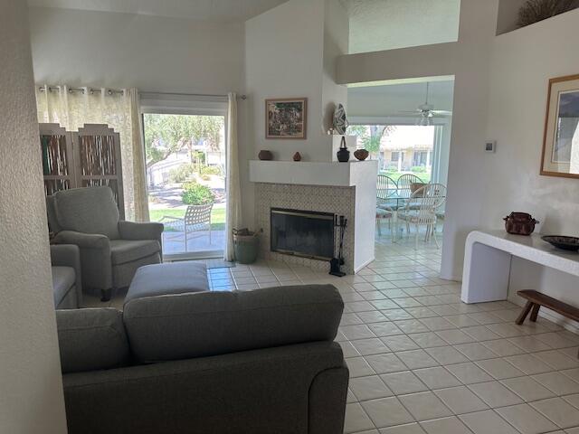 41694 Preston Trail Palm Desert, CA 92211 - Photo 4 of 20 a living room with furniture and a fireplace