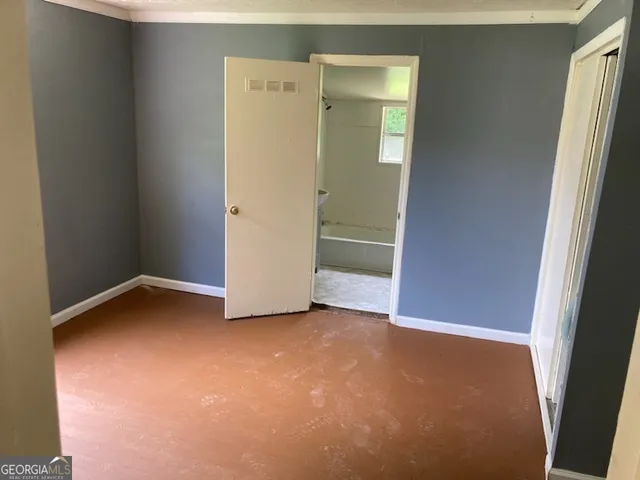 an empty room with closet
