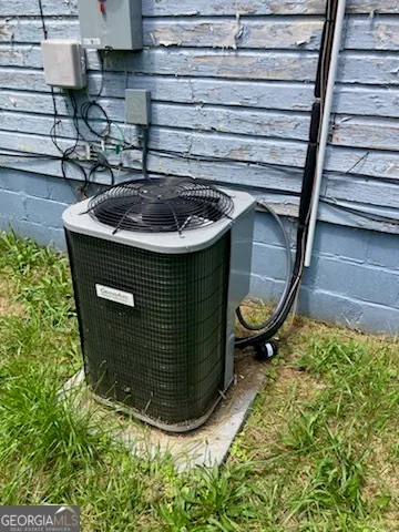 a view of bedroom and hallway