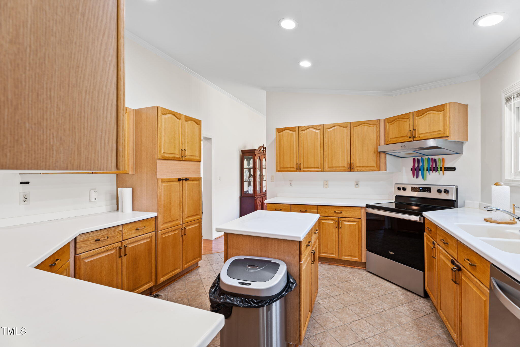 1855 Bullocksville Park Road Manson, NC 27553 - Photo 11 of 46 a kitchen with stainless steel appliances granite countertop a sink stove and refrigerator