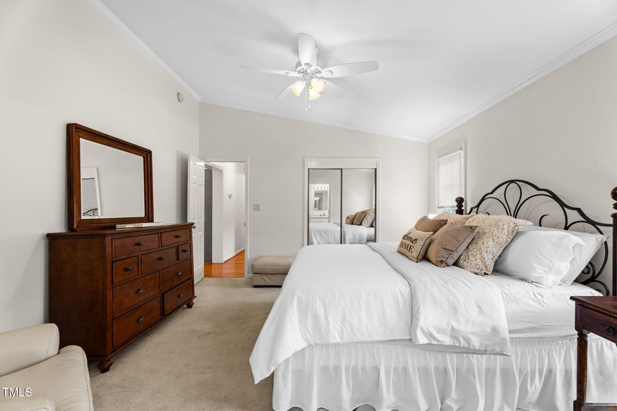1855 Bullocksville Park Road Manson, NC 27553 - Photo 16 of 46 a bedroom with a bed and a flat tv screen on dresser