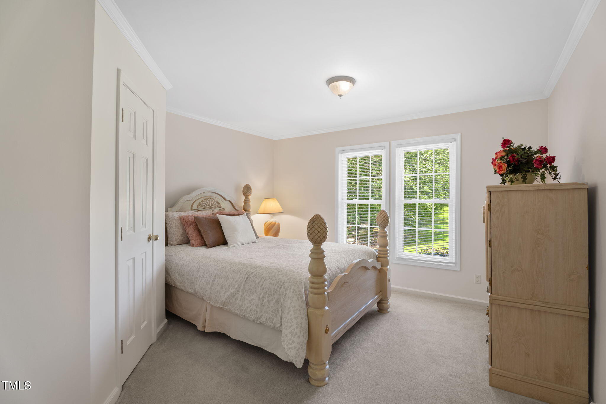 1855 Bullocksville Park Road Manson, NC 27553 - Photo 24 of 46 a bed sitting in a room next to a window