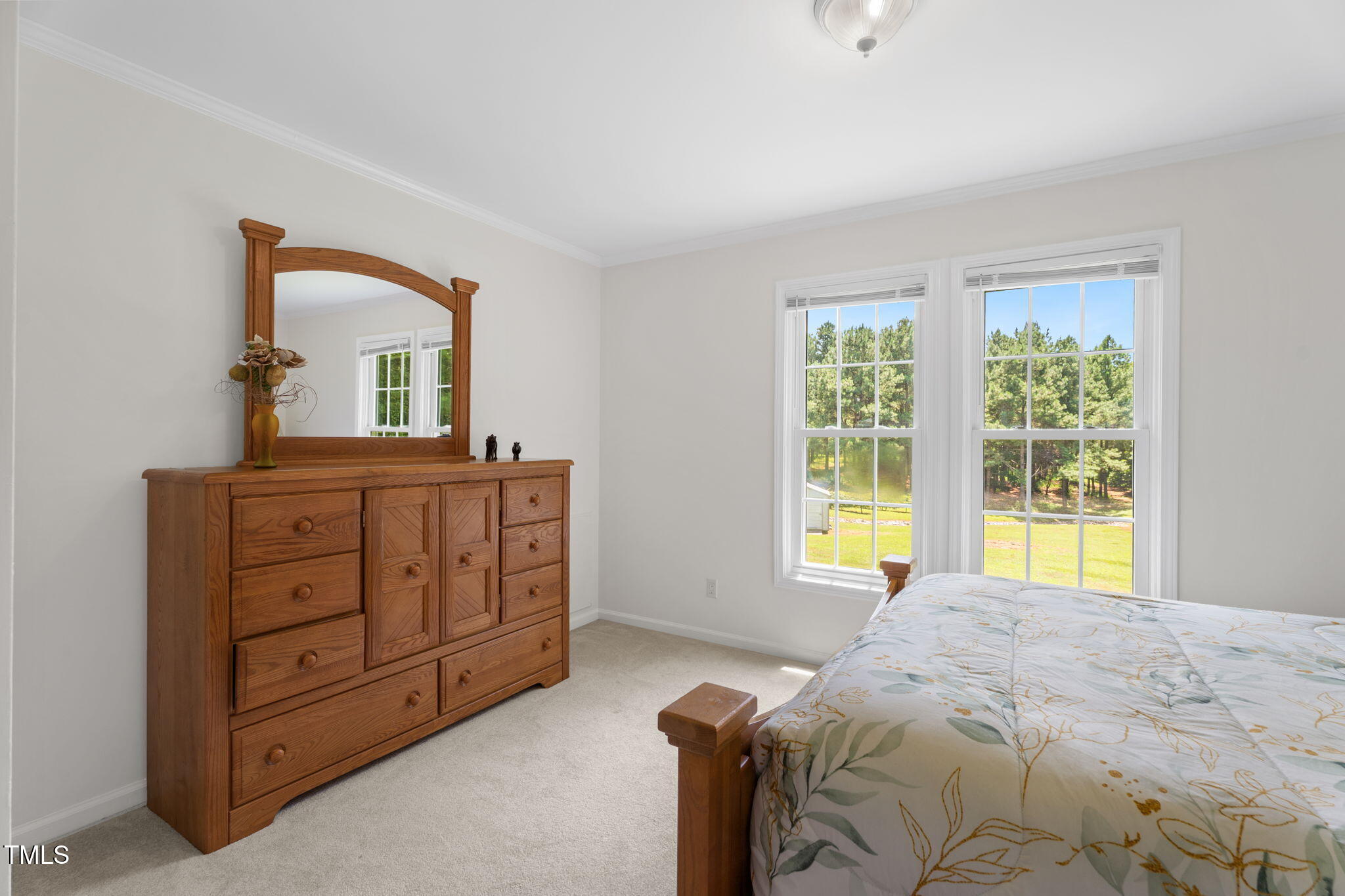 1855 Bullocksville Park Road Manson, NC 27553 - Photo 27 of 46 a bedroom with a bed and a dresser