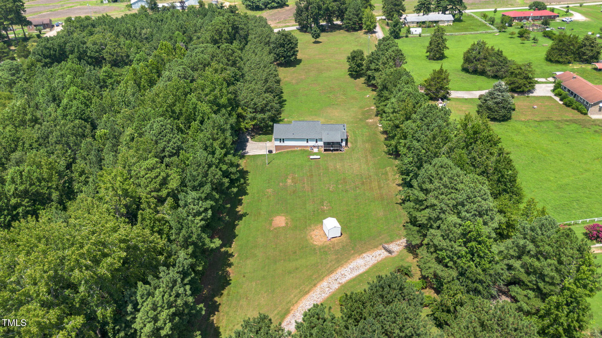 1855 Bullocksville Park Road Manson, NC 27553 - Photo 2 of 46 an aerial view of a house with a yard and lake view