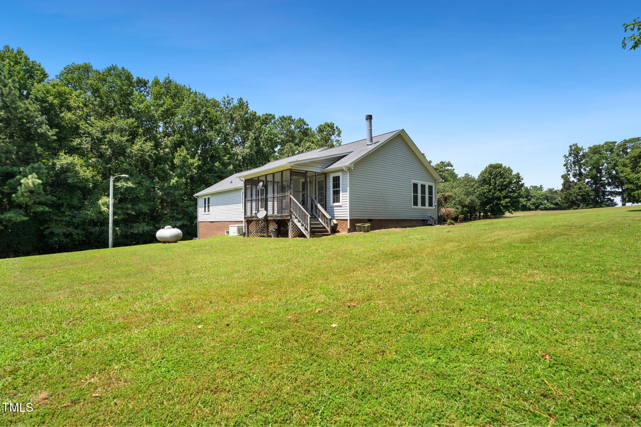 1855 Bullocksville Park Road Manson, NC 27553 - Photo 38 of 46 a view of a house with backyard and garden