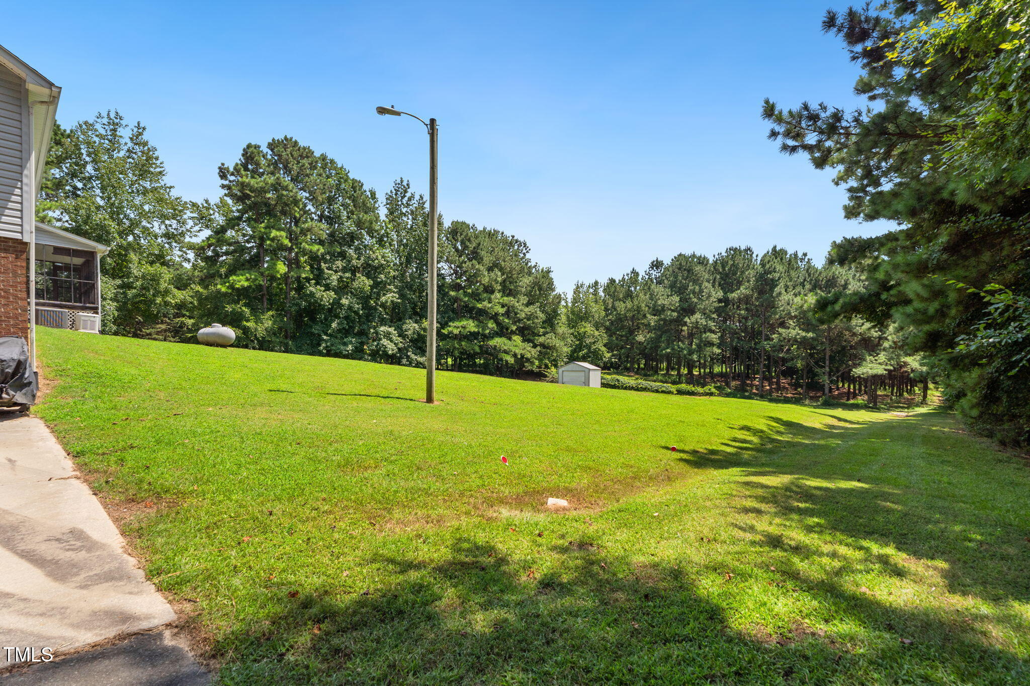 1855 Bullocksville Park Road Manson, NC 27553 - Photo 39 of 46 a view of a field with a tree in the background