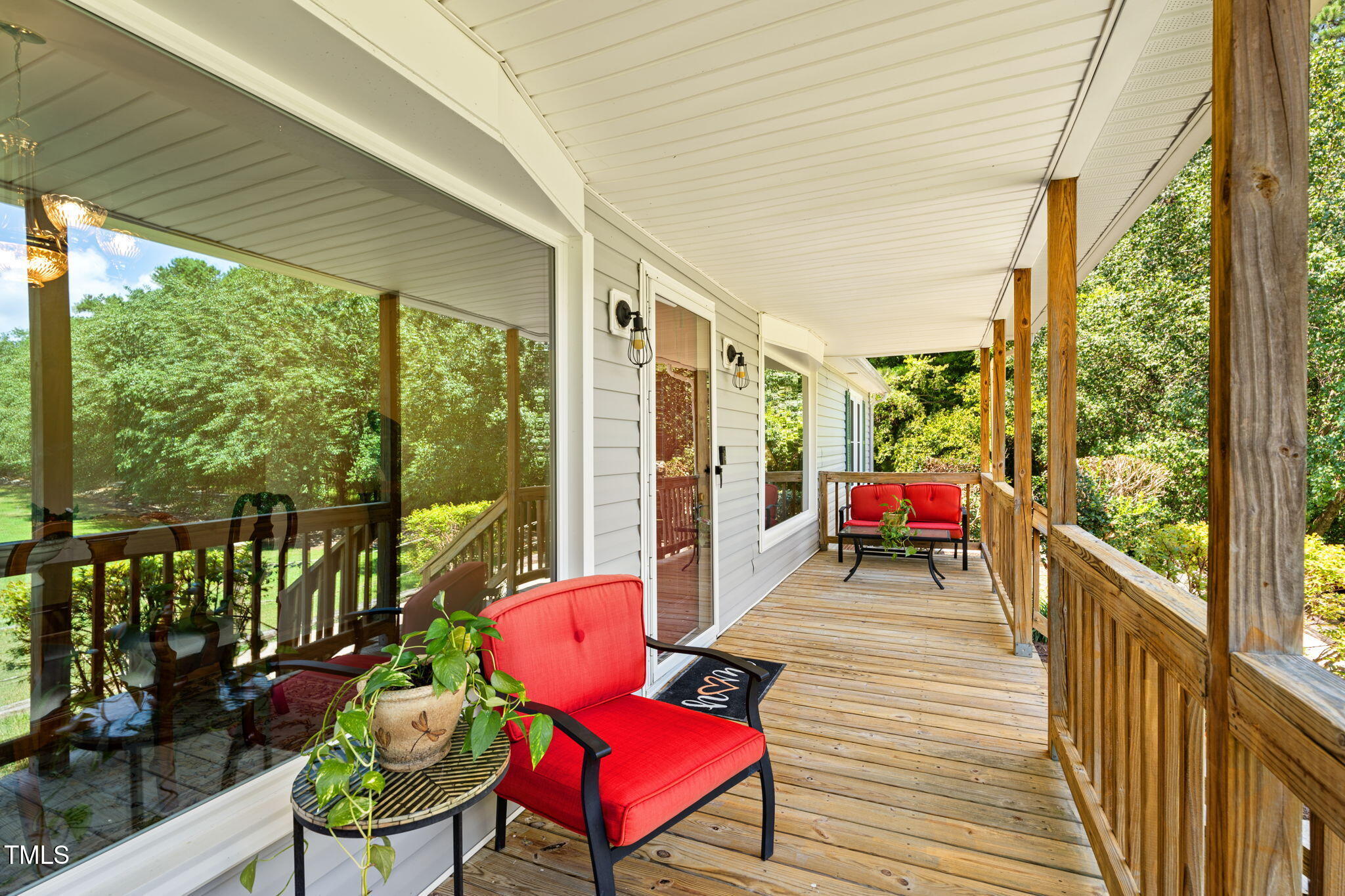 1855 Bullocksville Park Road Manson, NC 27553 - Photo 3 of 46 a balcony with furniture and wooden floor