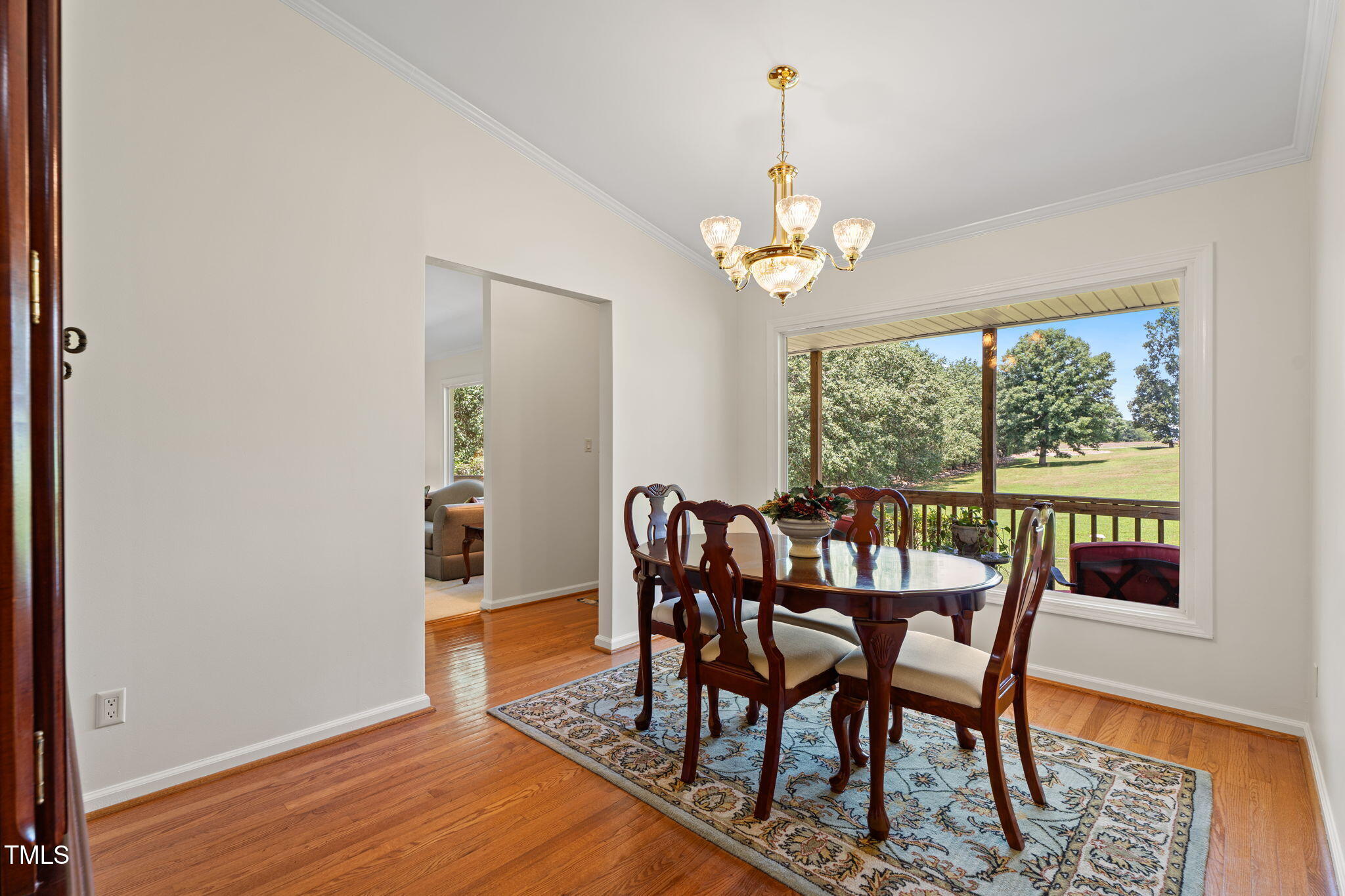 1855 Bullocksville Park Road Manson, NC 27553 - Photo 5 of 46 a view of a dining room with furniture wooden floor and chandelier