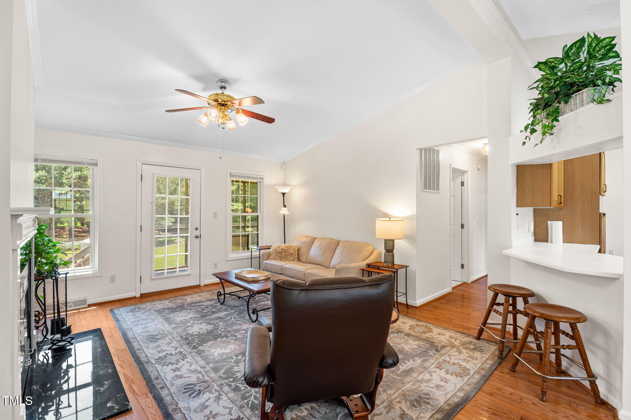 1855 Bullocksville Park Road Manson, NC 27553 - Photo 6 of 46 a living room with furniture flowerpot and wooden floor