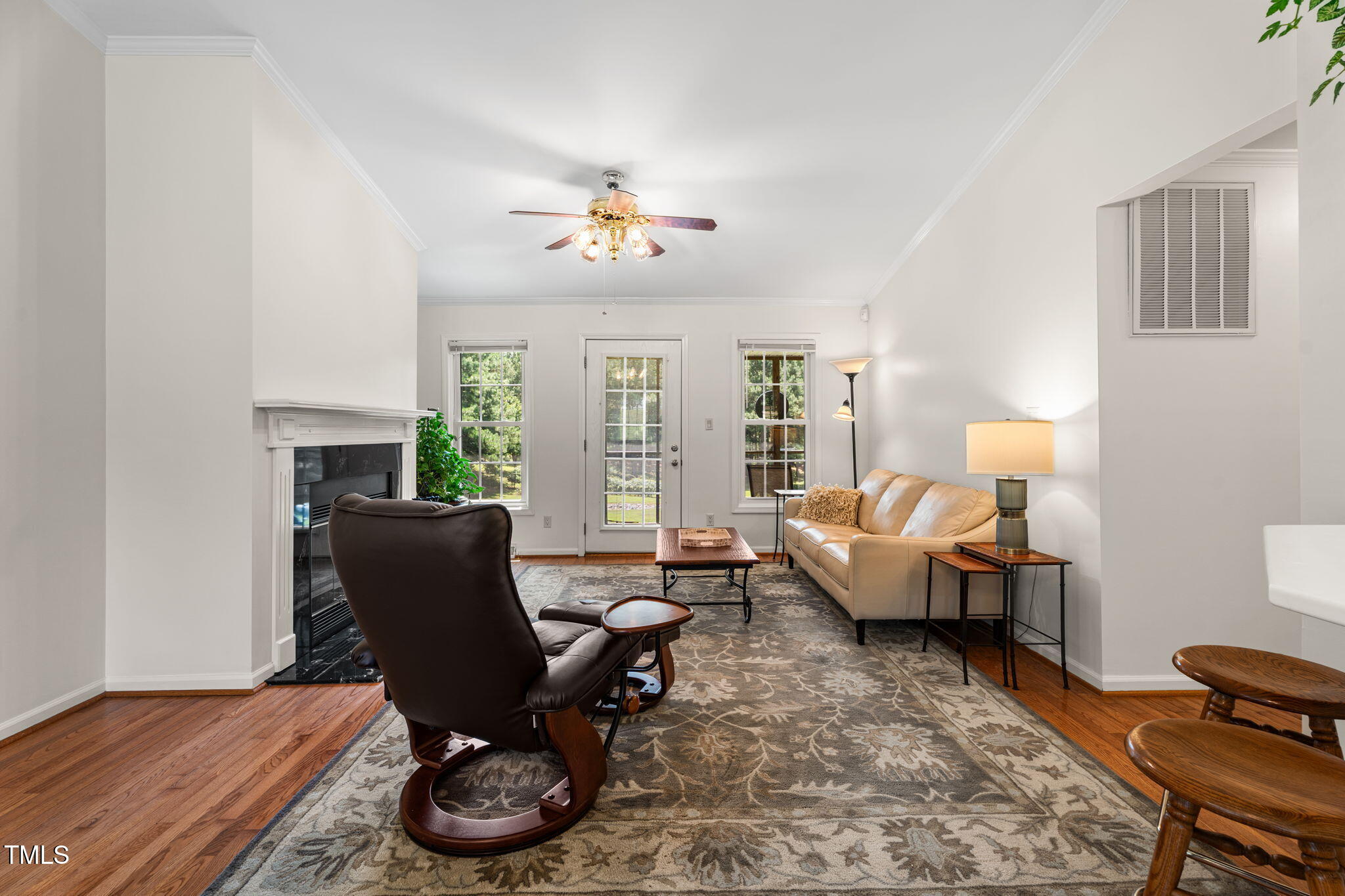 1855 Bullocksville Park Road Manson, NC 27553 - Photo 7 of 46 a living room with furniture a fireplace and a window