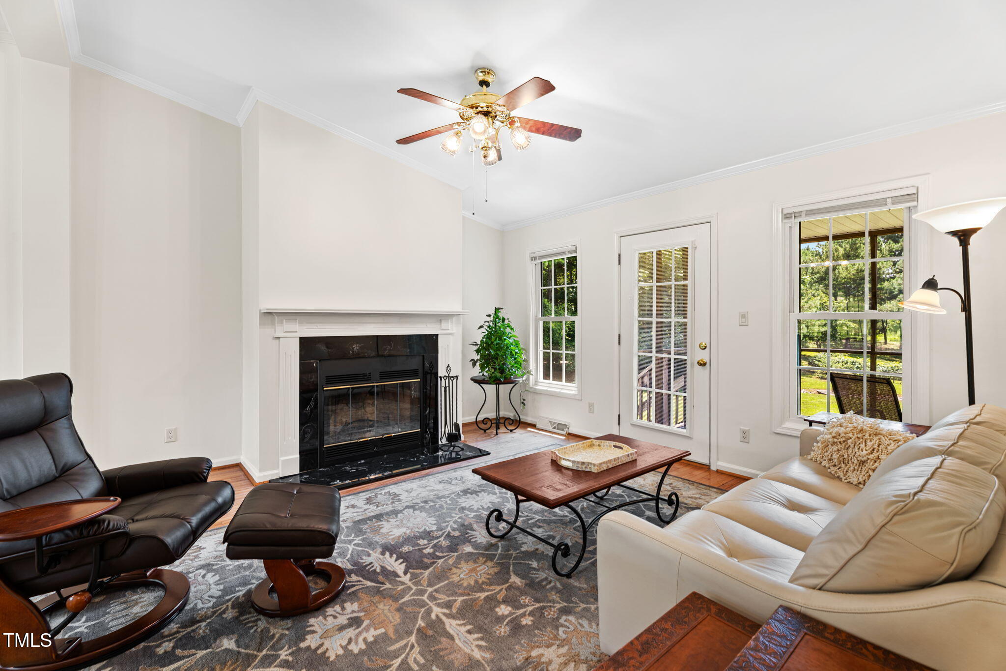 1855 Bullocksville Park Road Manson, NC 27553 - Photo 8 of 46 a living room with furniture a fireplace and a floor to ceiling window