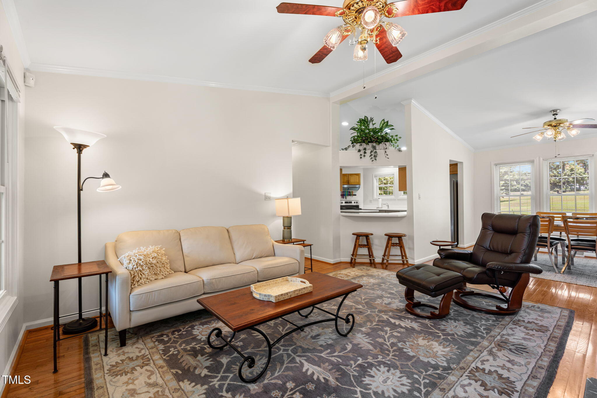 1855 Bullocksville Park Road Manson, NC 27553 - Photo 9 of 46 a living room with furniture a rug and a chandelier