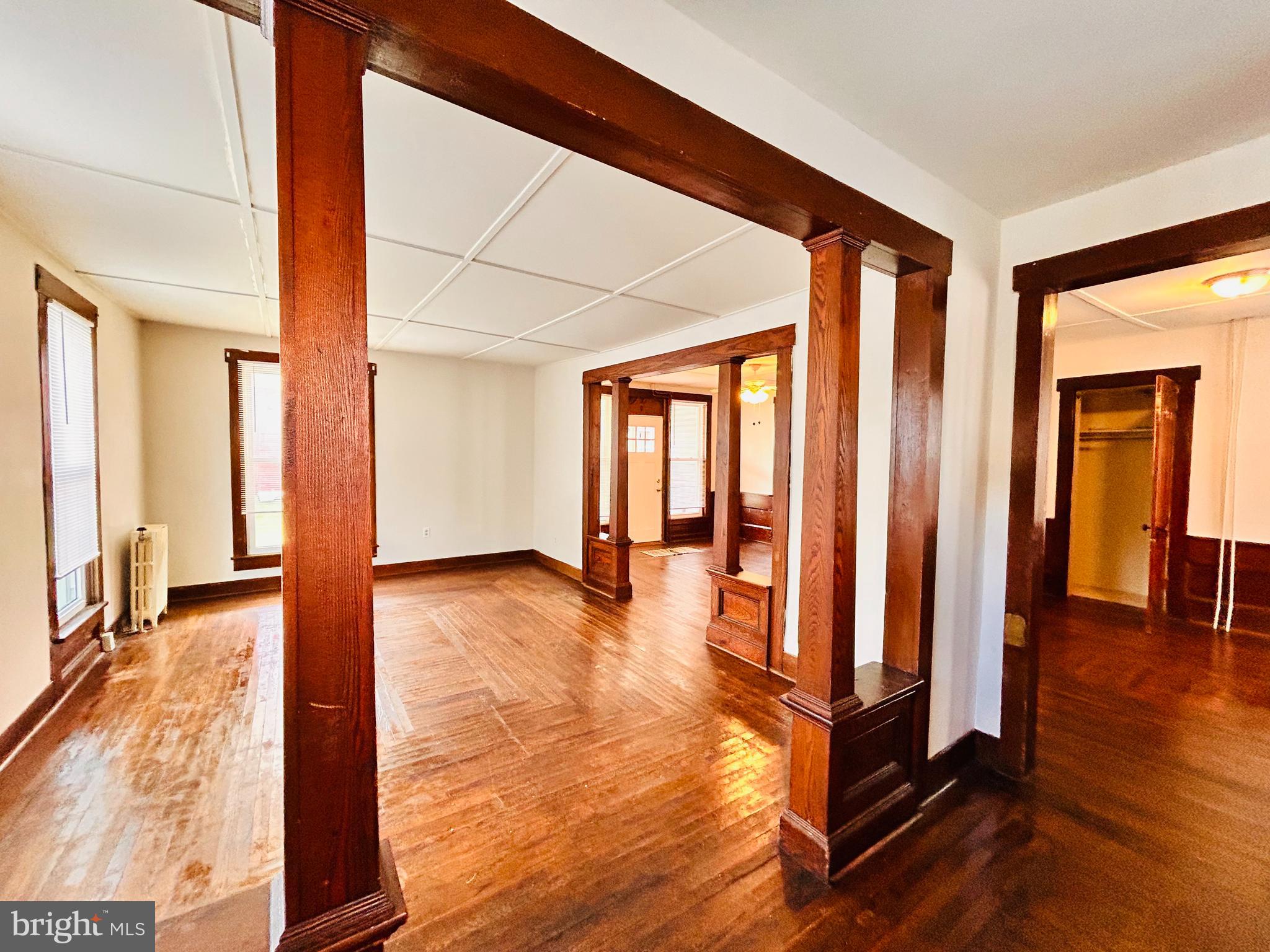 113 West Main Street Millheim, PA 16854 - Photo 20 of 30 a view of front door with wooden floor and chair