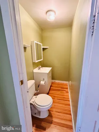 a bathroom with a toilet and a sink