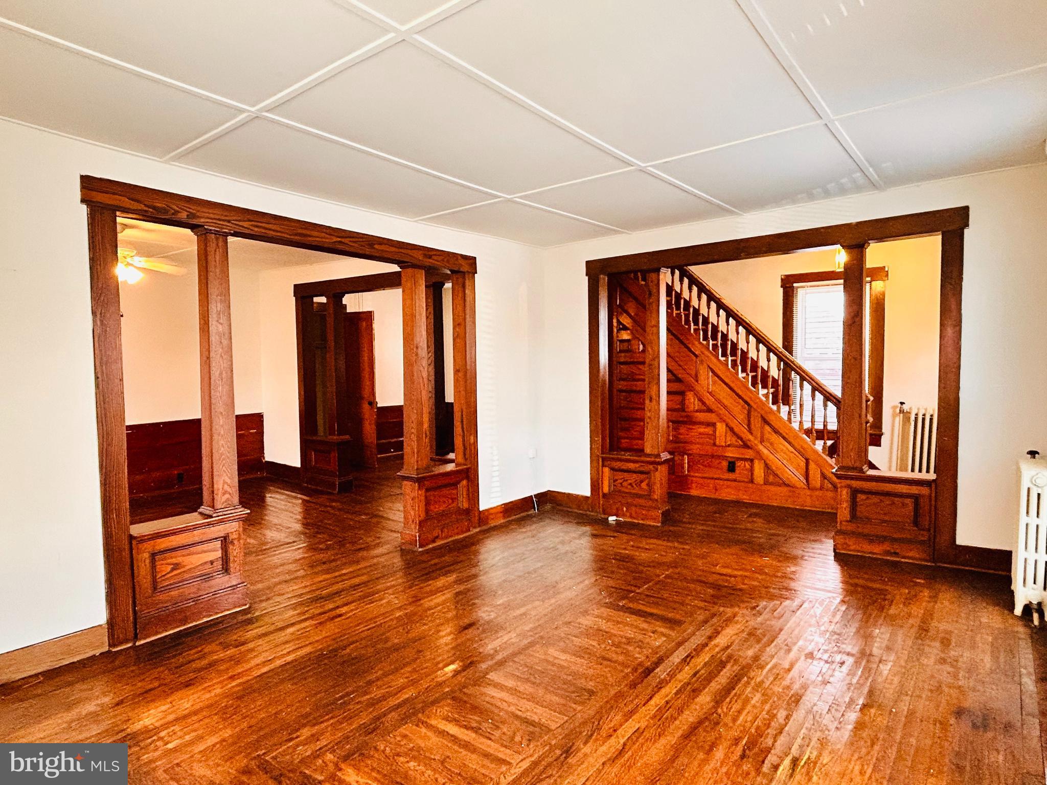 113 West Main Street Millheim, PA 16854 - Photo 29 of 30 a view of empty room with wooden floor and fan