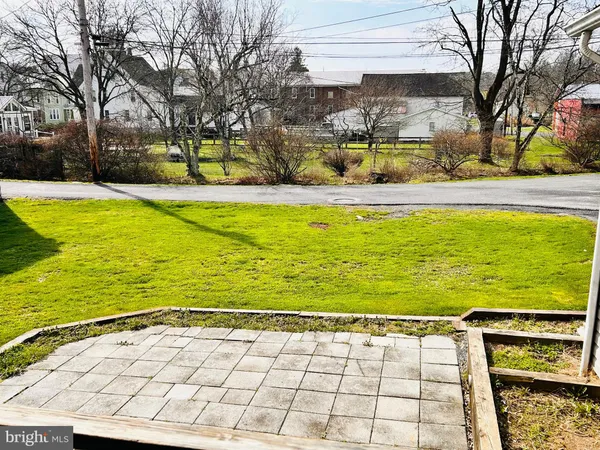 a view of swimming pool with an outdoor space and seating area