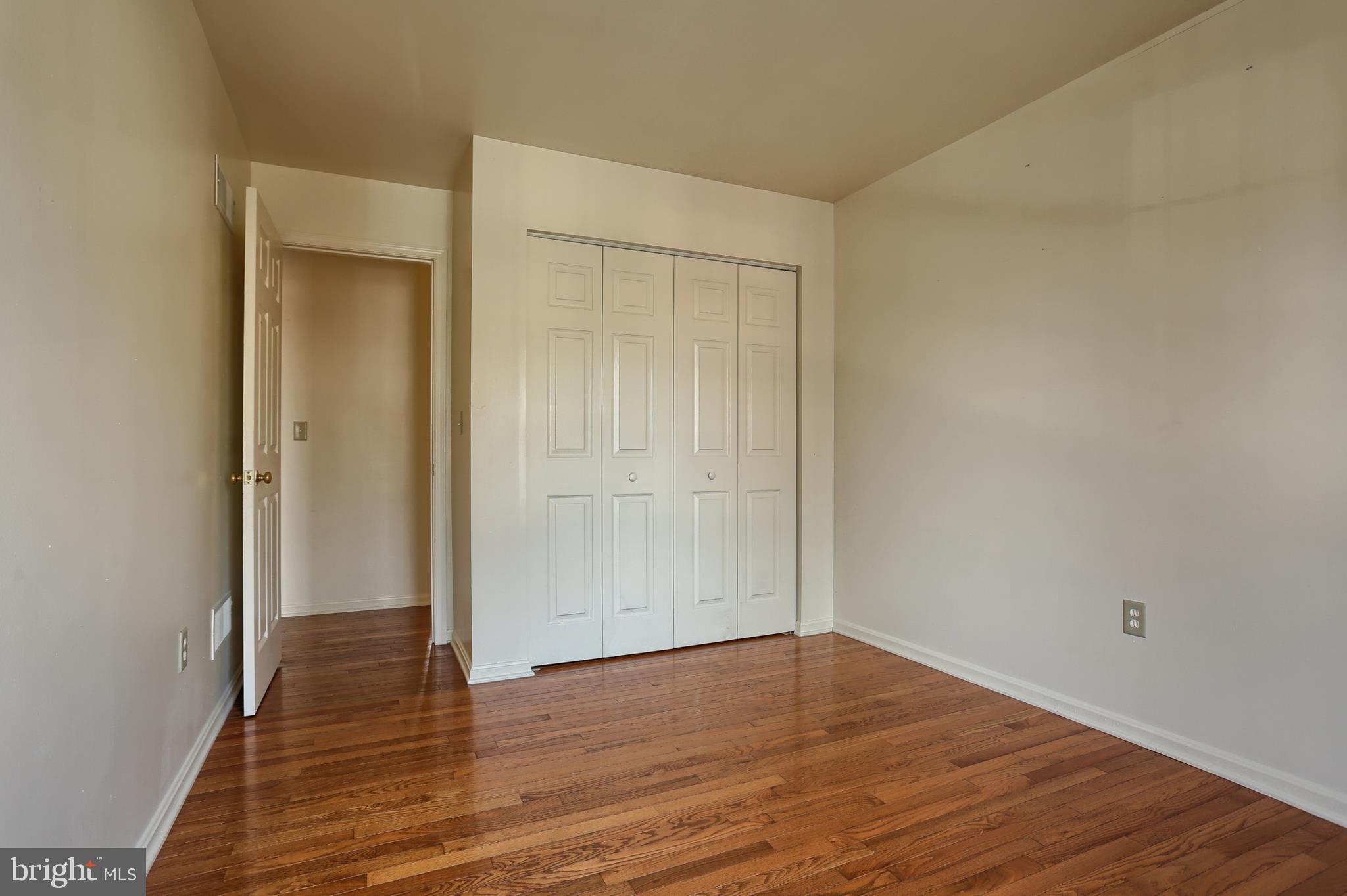 2051 B Raleigh Road, Unit B Hummelstown, PA 17036 - Photo 17 of 27 a view of empty room with wooden floor