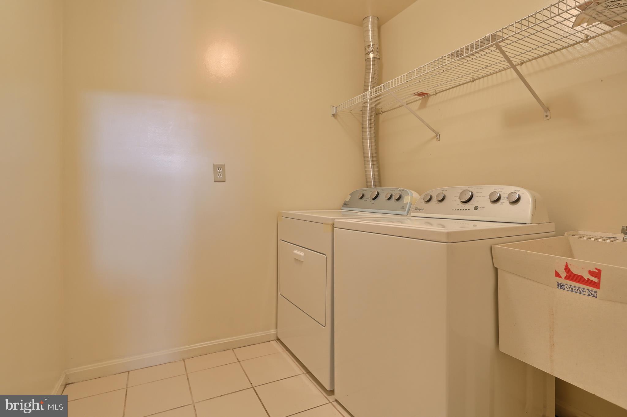 2051 B Raleigh Road, Unit B Hummelstown, PA 17036 - Photo 21 of 27 a utility room with dryer and washer