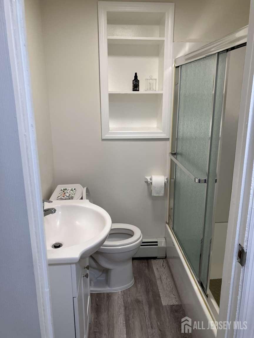 141 Dunbar Avenue Fords, NJ 08863 - Photo 18 of 25 a bathroom with a sink toilet and shower