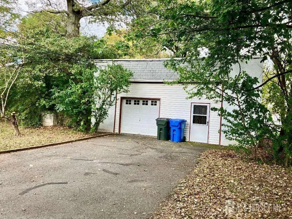 a house with a tree in front of it