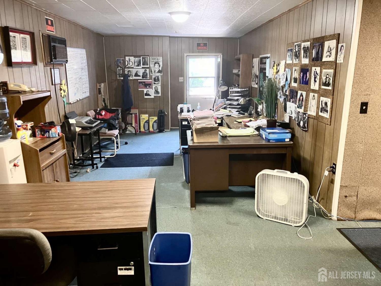 141 Dunbar Avenue Fords, NJ 08863 - Photo 23 of 25 a living room with furniture and a flat screen tv
