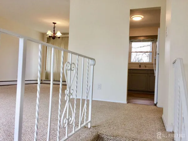 a view of a livingroom with a staircase