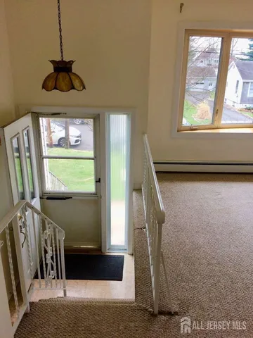 a view of entryway with a front door
