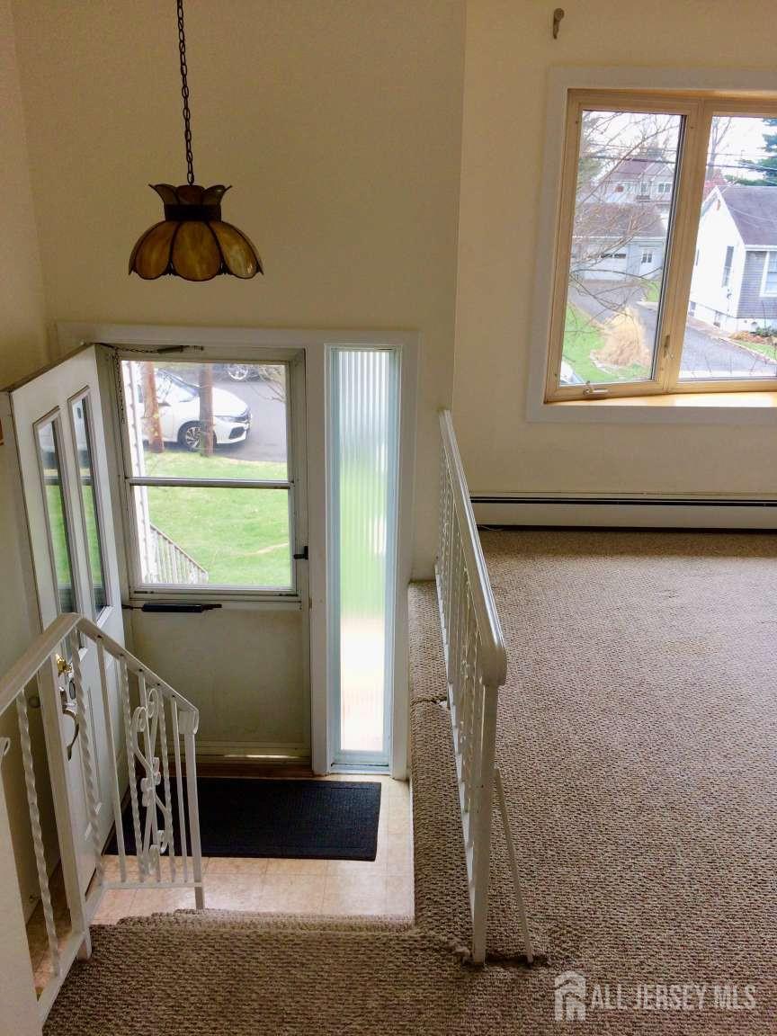 141 Dunbar Avenue Fords, NJ 08863 - Photo 6 of 25 a view of entryway with a front door