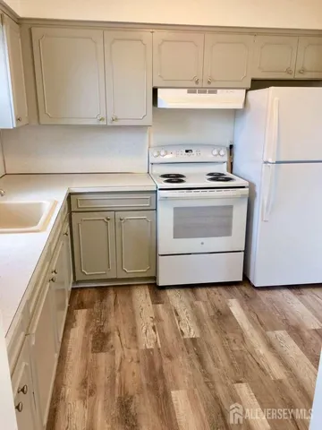 a utility room with washer and dryer