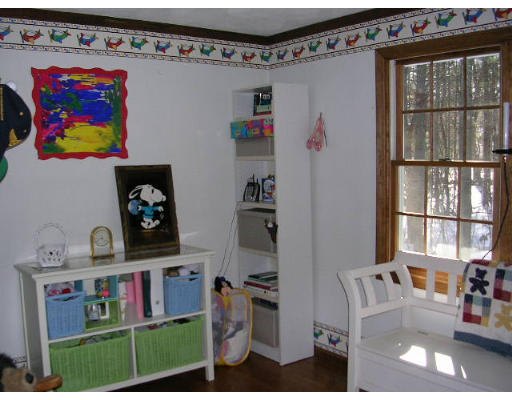 135 Taylor Road Stow, MA 01775 - Photo 12 of 14 a utility room with lots of clutter and cabinets