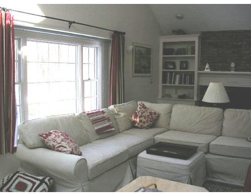 135 Taylor Road Stow, MA 01775 - Photo 5 of 14 a living room with furniture and a window