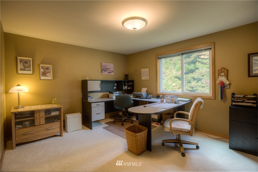 3124 211th Street Southeast Bothell, WA 98021 - Photo 14 of 16 a view of a dining room with furniture window and outside view